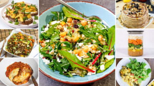 Salad in a bowl and six other dishes