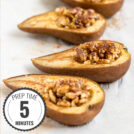 Four pear halves stuffed with walnuts and cinnamon are laid on a white surface with a time badge in the bottom left corner | Hurry The Food Up