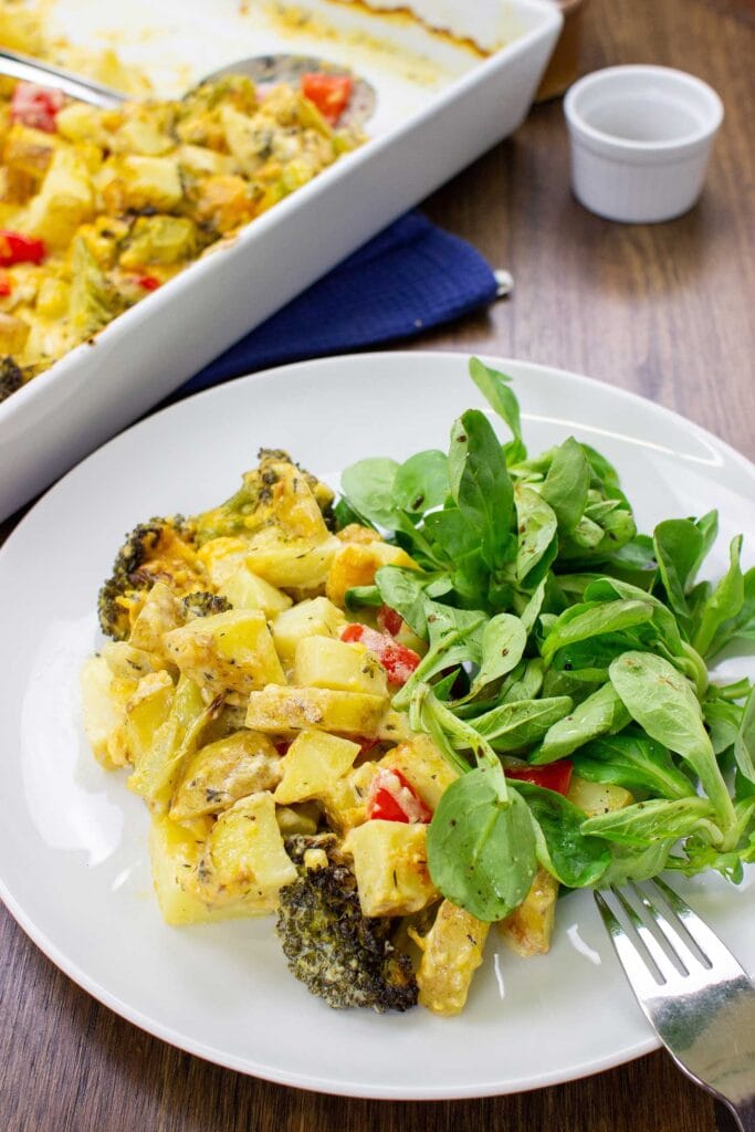 Broccoli Cheese Casserole is served on the table in the bowl #thyme #salt | hurrythefoodup.com