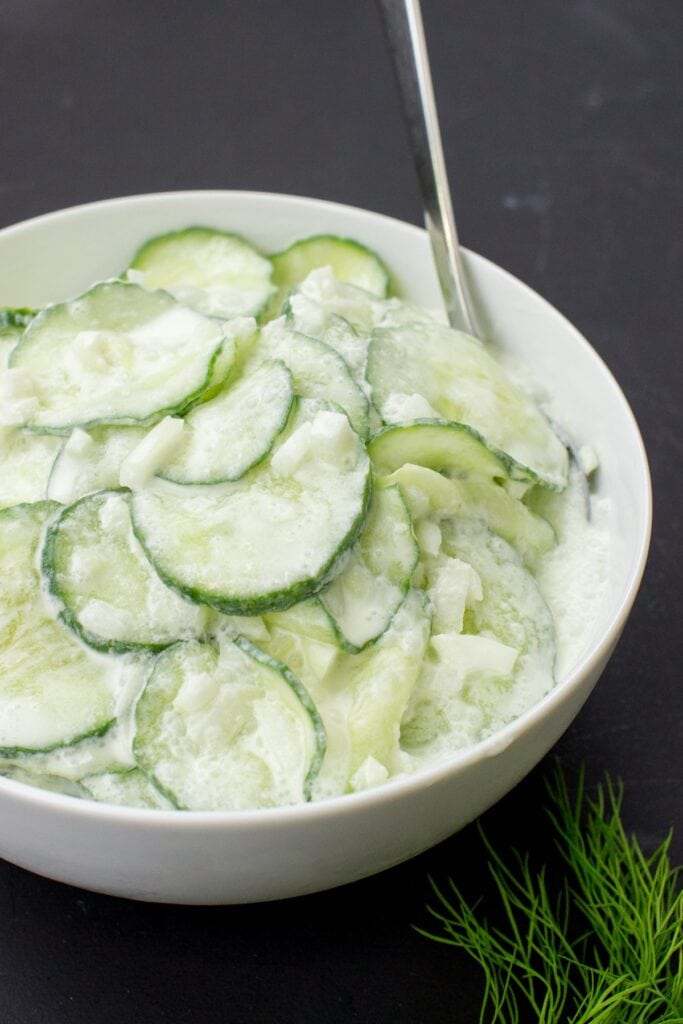 Grandma’s Creamy Cucumber Salad - Taste never gets old - cucumber salad is served #onion #salad | hurrythefoodup.com