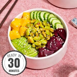 A vegetarian poke bowl alongside a pair of chopsticks with a time stamp | Hurry The Food Up