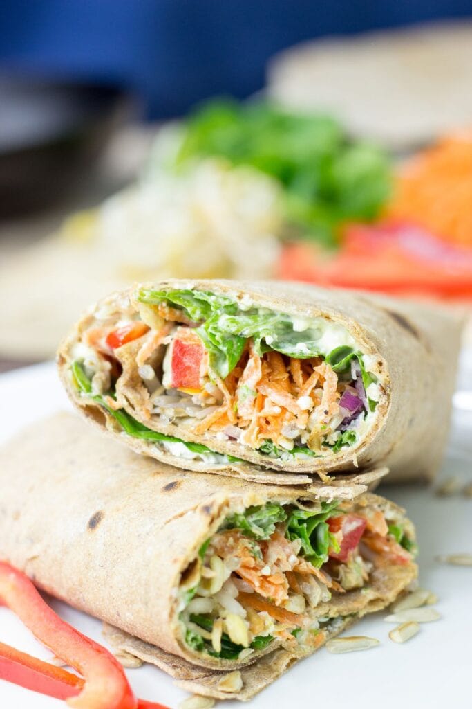 Two veggie wraps sit on the white plate | Hurry The Food Up